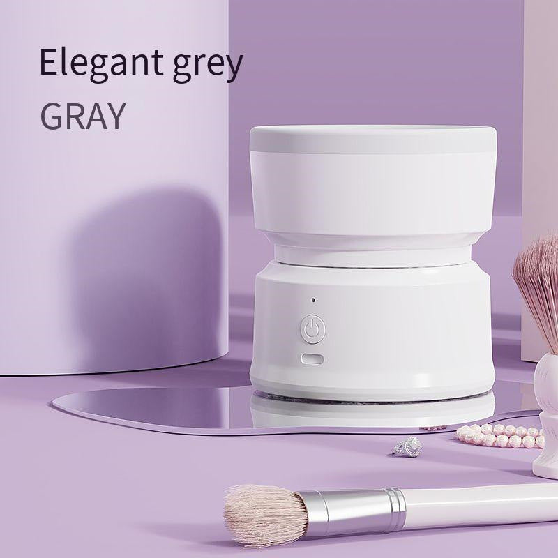 Compact automatic make up brush cleaner